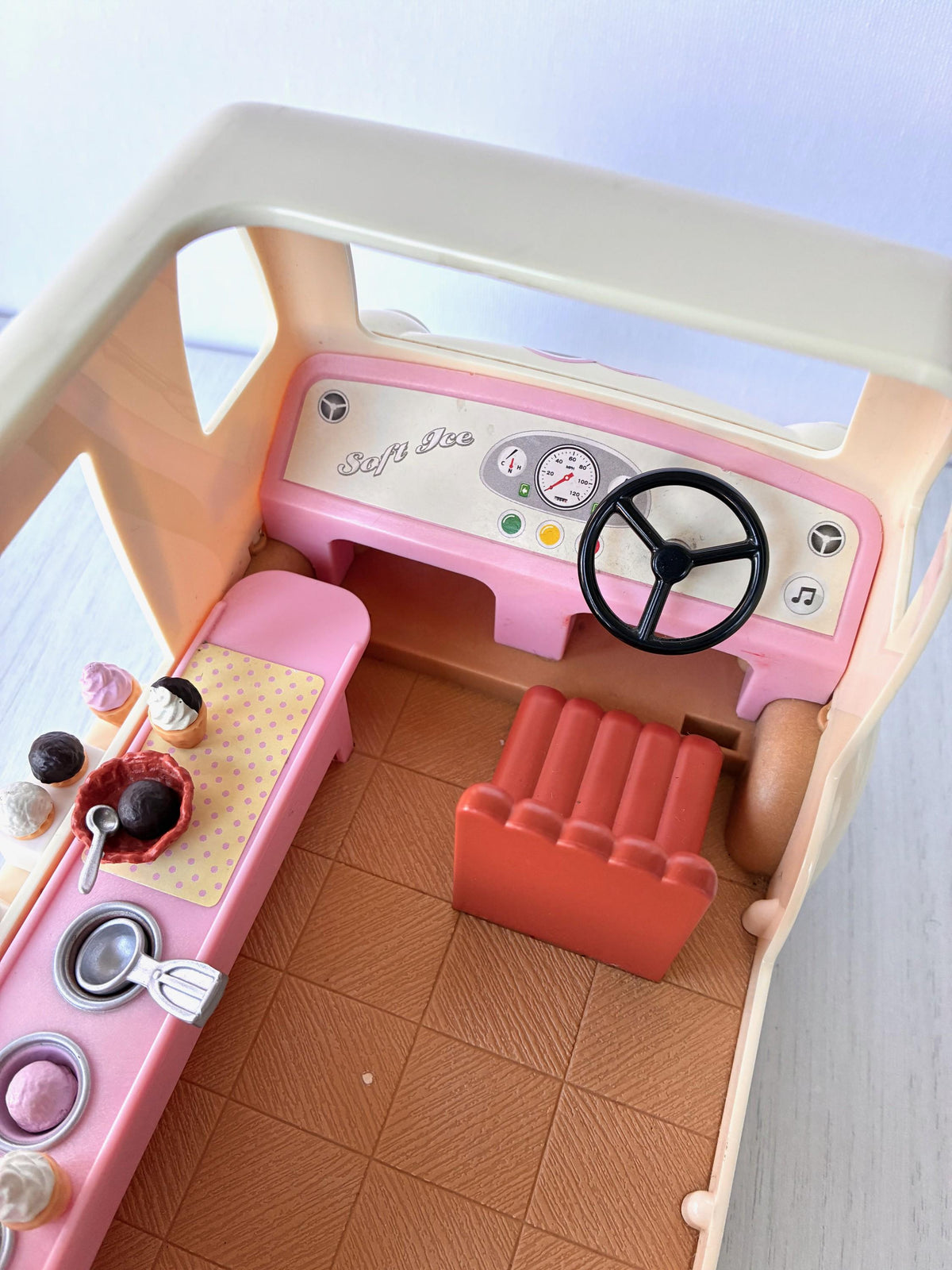 Sylvanian Families Calico Critters Ice Cream Van (Flair 4791) interior view showing counter, driver's seat and steering wheel