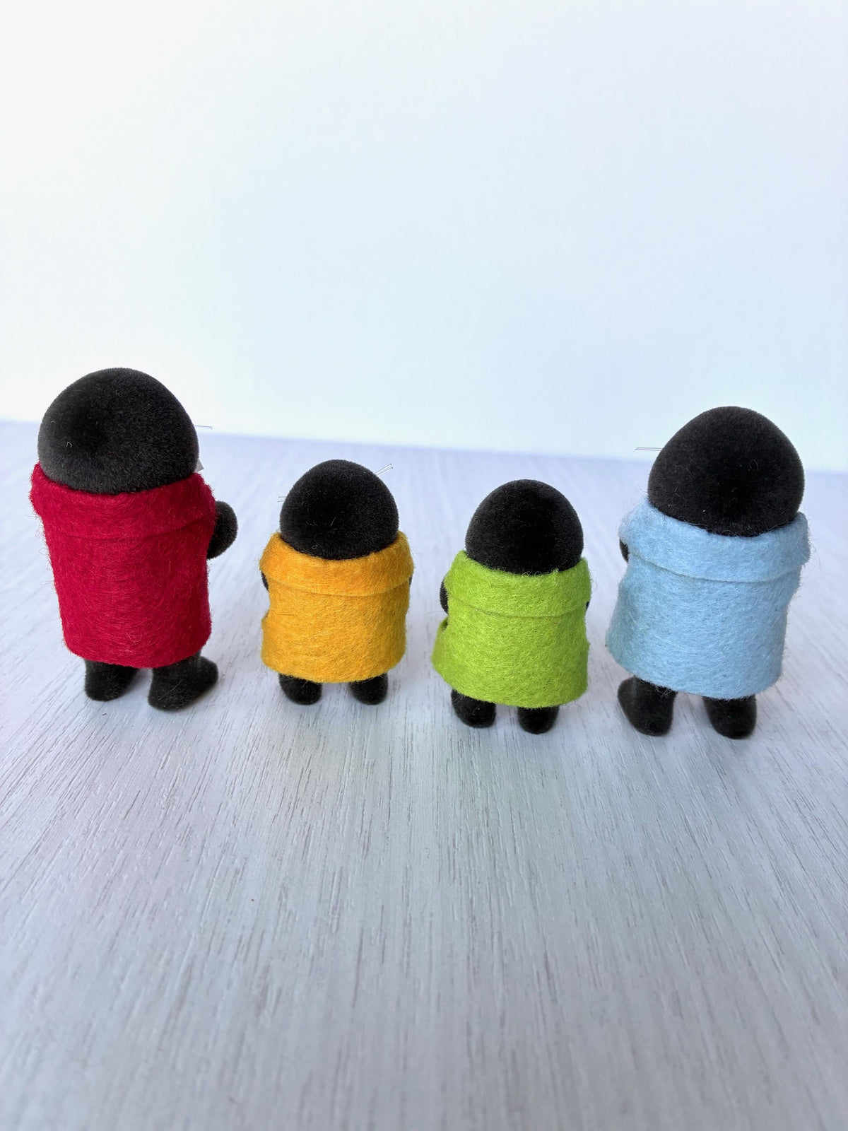 Calico Critters Sylvanian Families vintage McBurrows mole family, back view of all four showing the felt capes