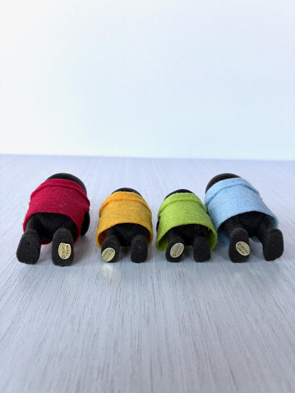 Calico Critters Sylvanian Families vintage McBurrows mole family, undersides showing the gold 1985 Epoch Taiwan foot stickers on all four