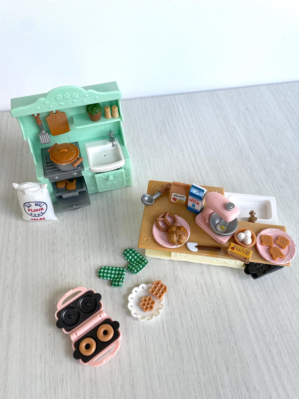 Every piece laid out: mint dresser, prep island, waffle iron, gingham cloths and all food — Calico Critters and Sylvanian Families