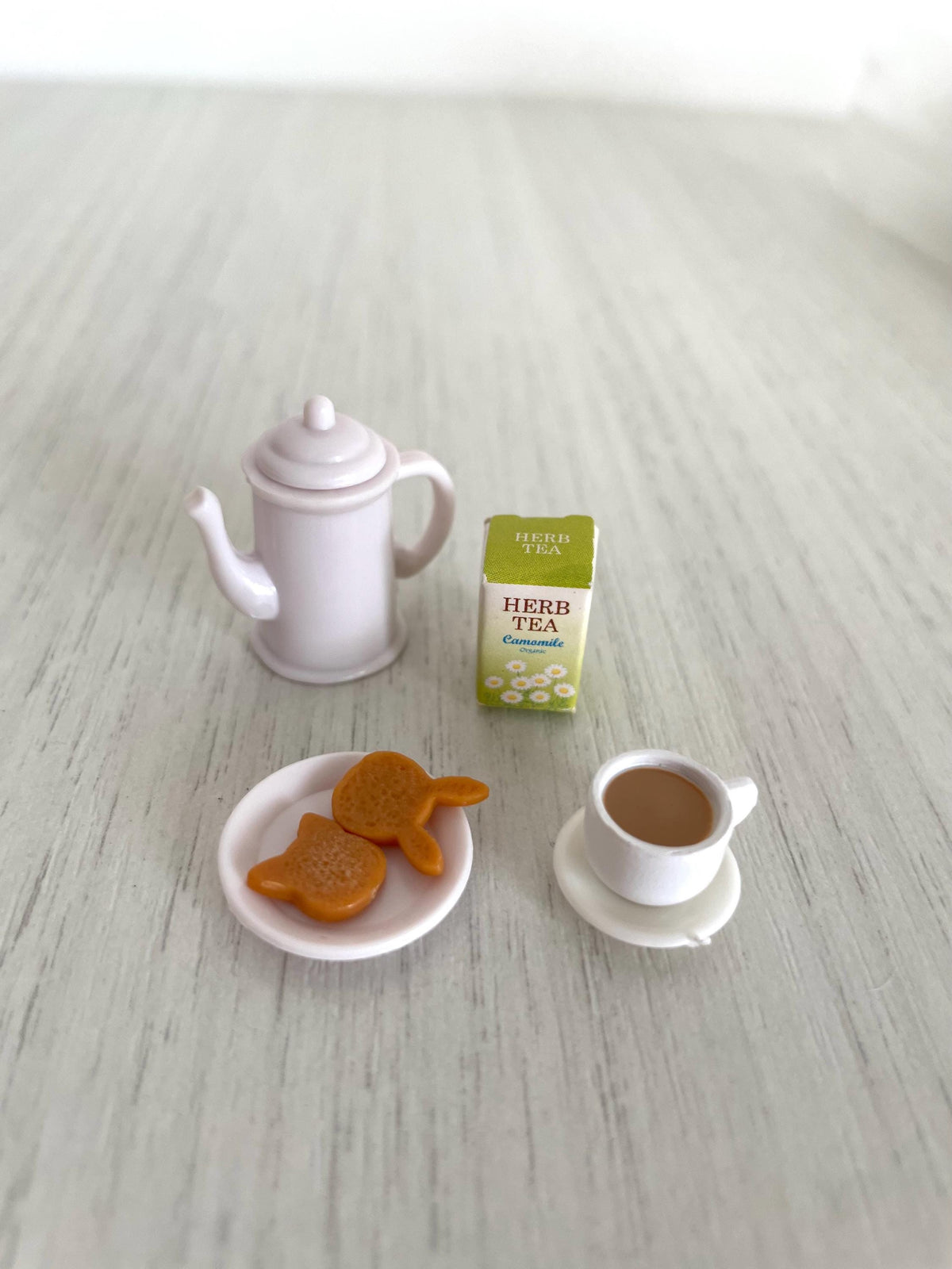 Tea set with kettle, herb tea box, biscuits and teacup, front angle — Calico Critters and Sylvanian Families