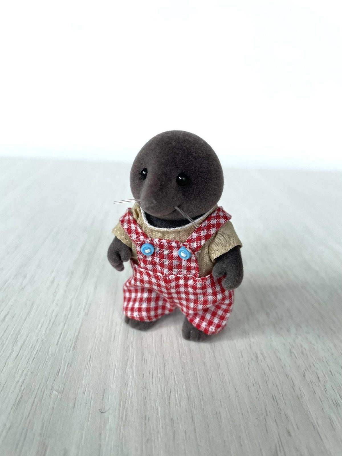 Vintage grey mole dad in red gingham overalls standing, front view — Calico Critters and Sylvanian Families