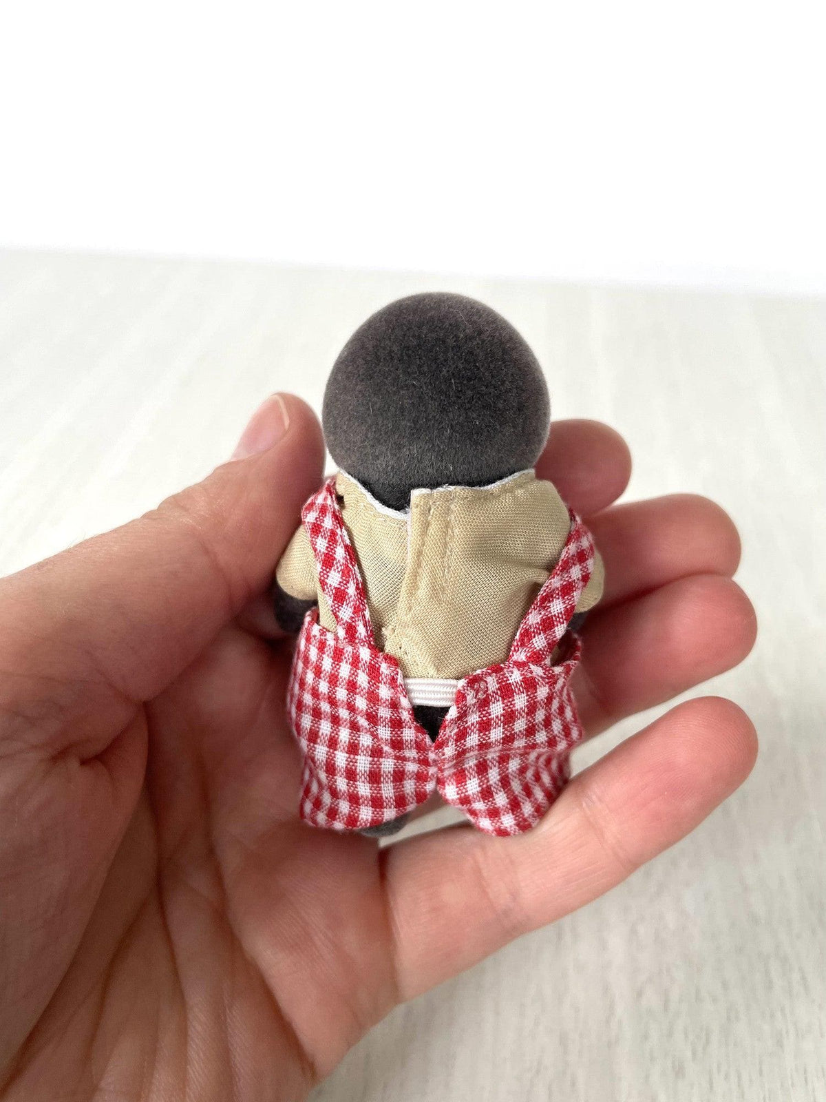 Back view of the mole dad's red gingham overalls — Calico Critters and Sylvanian Families