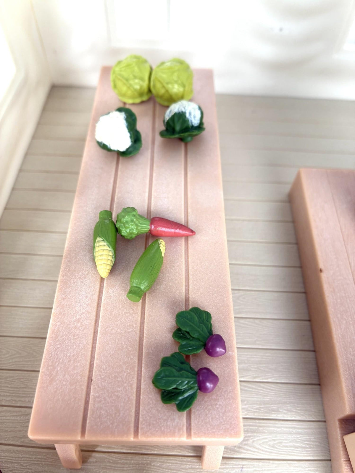 Calico Critters Sylvanian Families Marquee vegetable competition entries close-up, cabbages, carrot, corn and aubergine