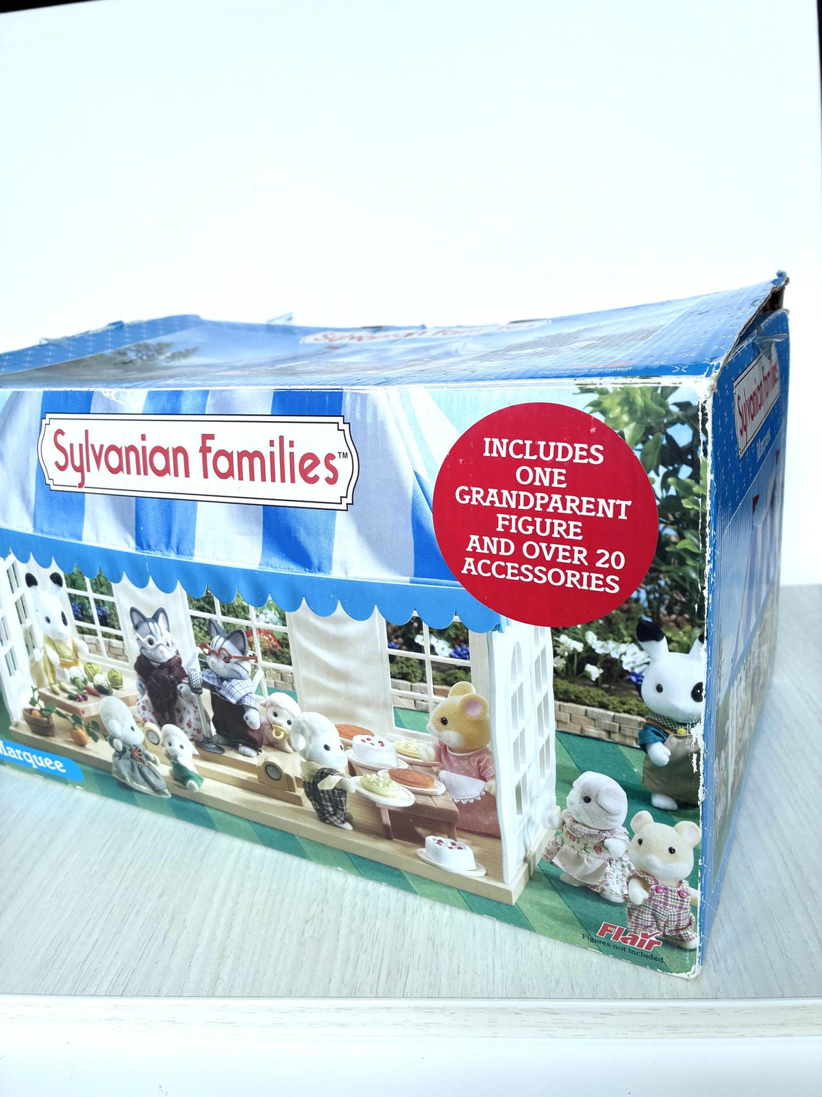 Calico Critters Sylvanian Families Marquee original Flair box front, includes one grandparent figure and over 20 accessories