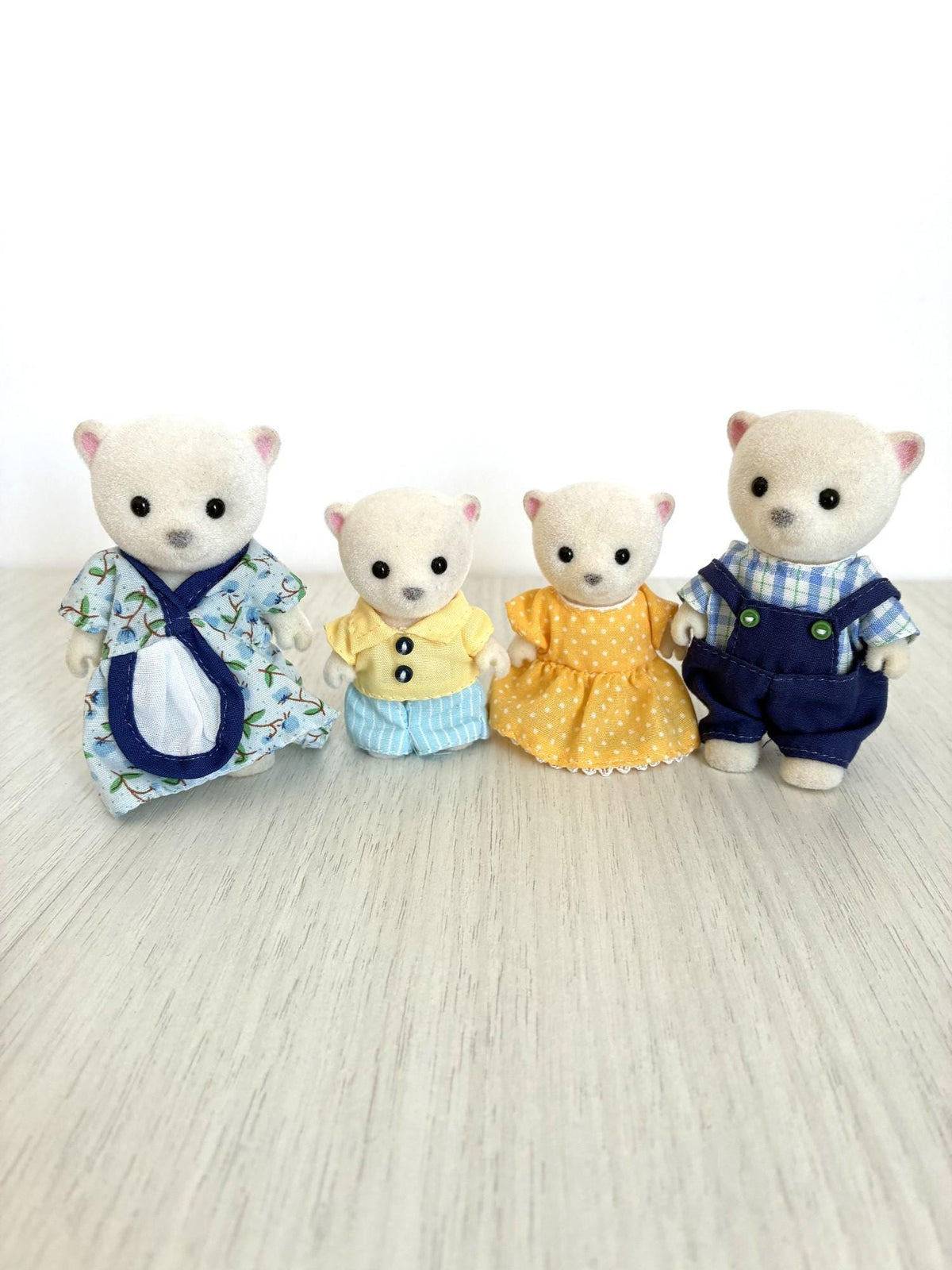 Calico Critters Sylvanian Families Beaufort Polar Bear Family Flair 4436, father mother brother and sister in original clothes, front view