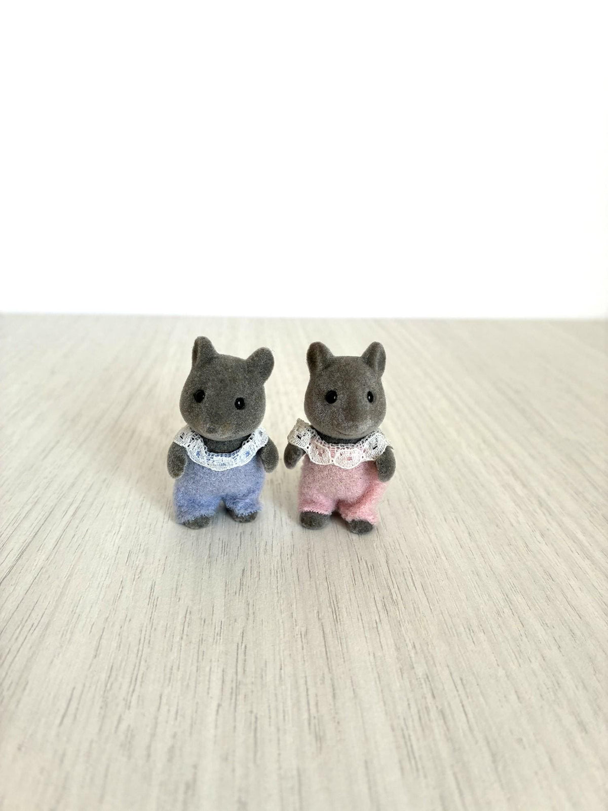 Calico Critters Sylvanian Families grey mouse baby pair standing on white background