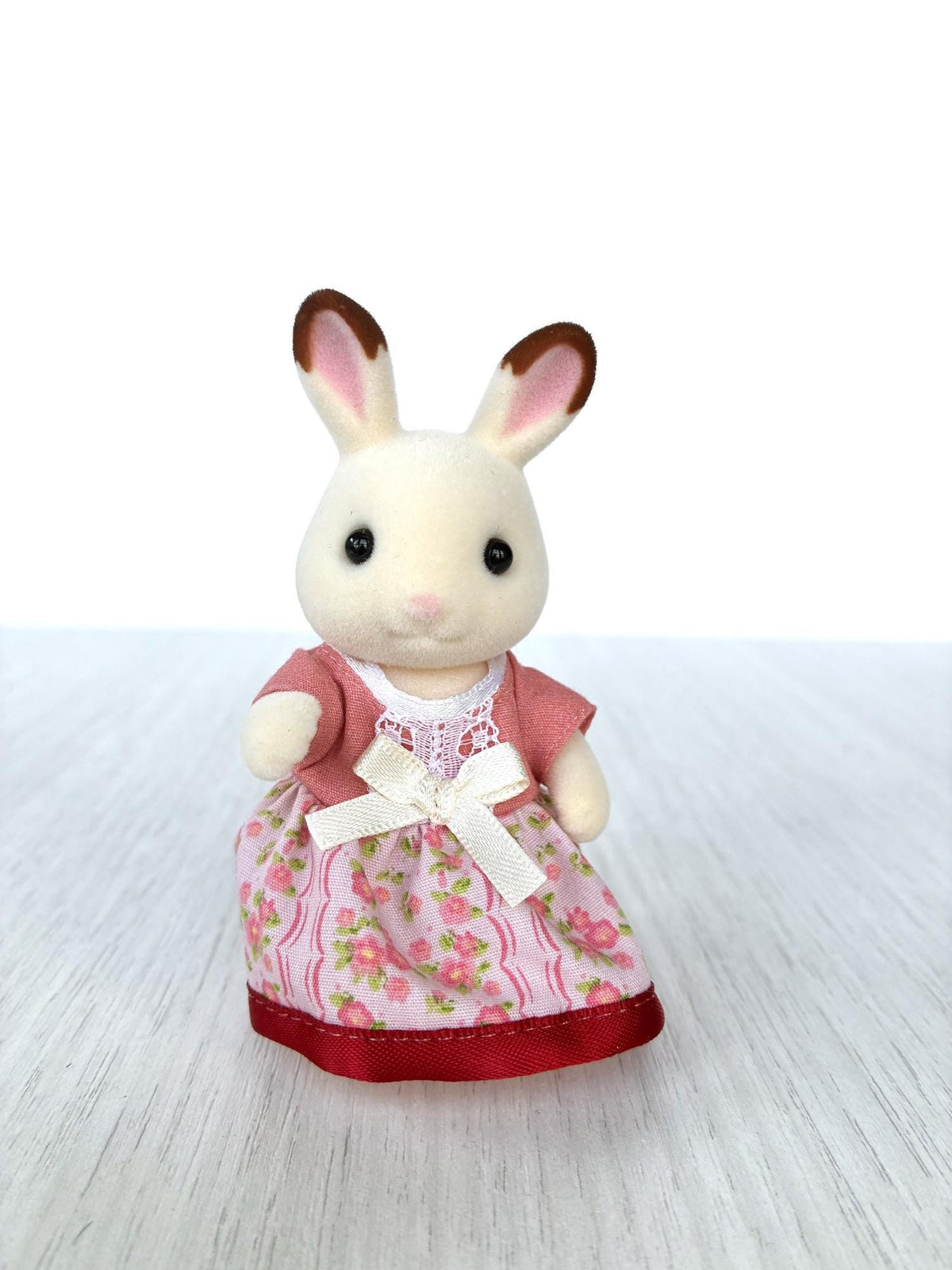 Calico Critters Sylvanian Families Hopscotch Chocolate rabbit mother in pink floral dress with bow, front view