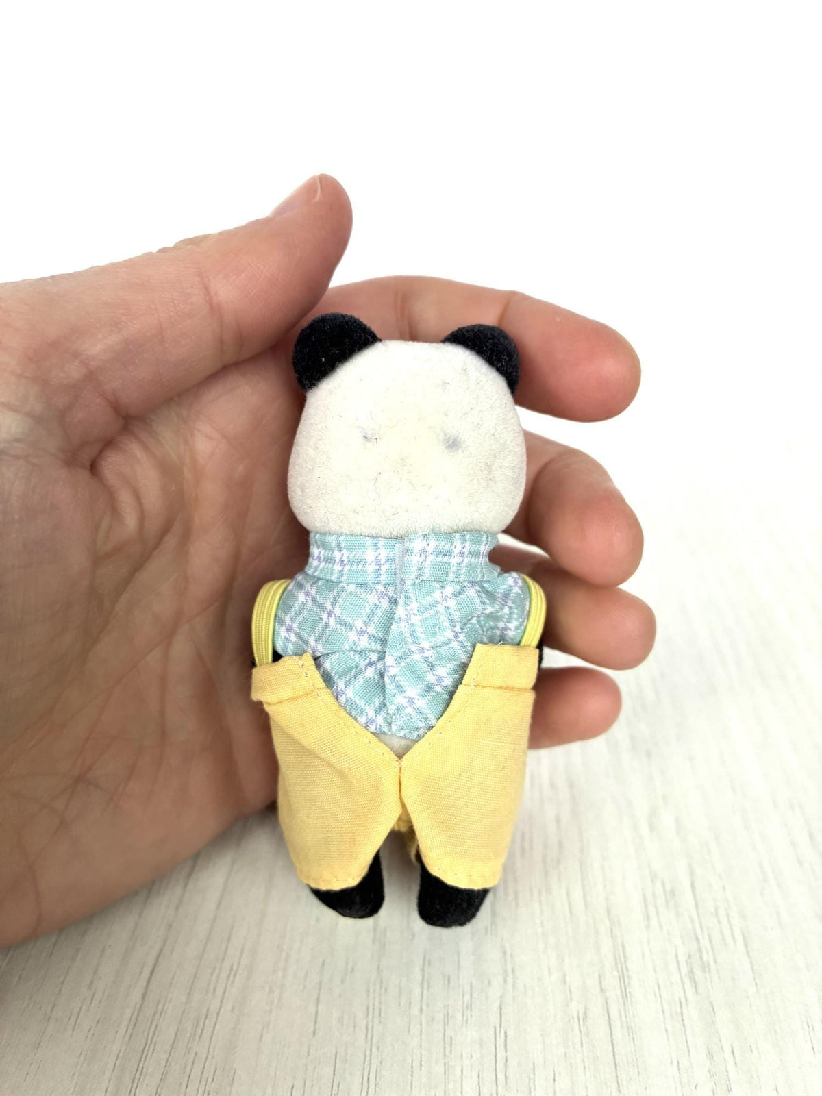 Calico Critters Sylvanian Families panda dad back view with black flaws on white flocking