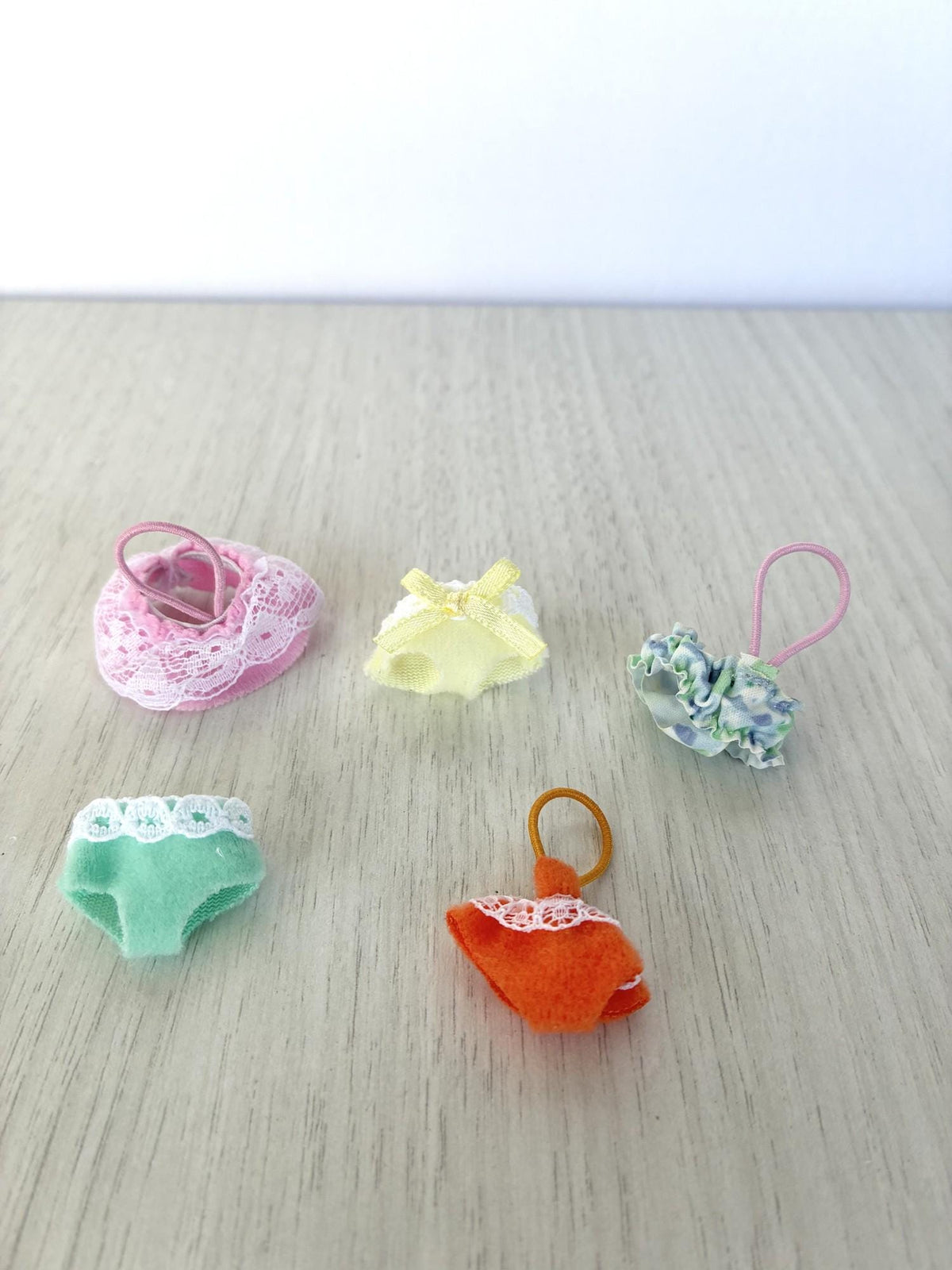 Calico Critters Sylvanian Families baby outfits you pick, five baby clothes laid out