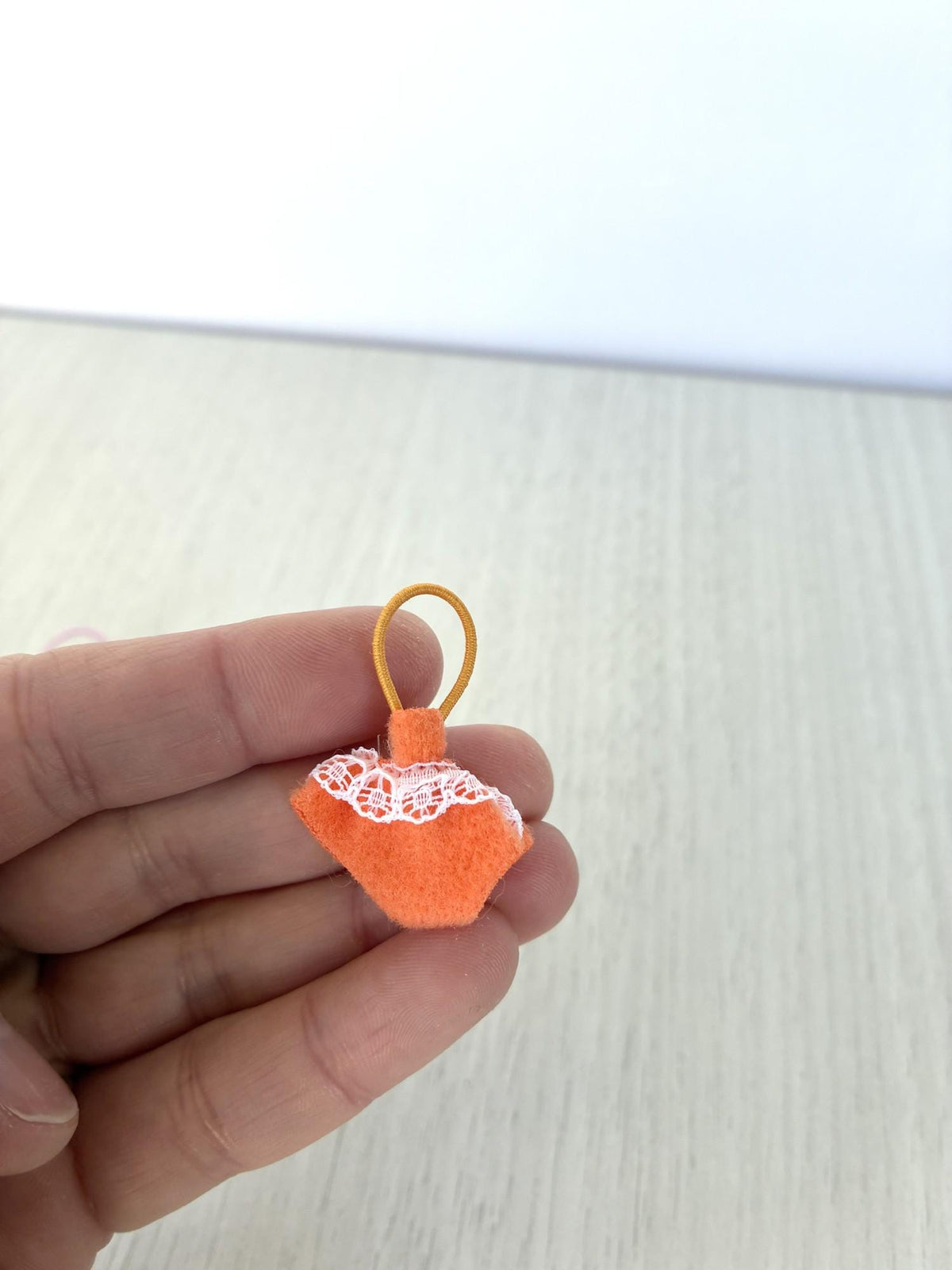 Calico Critters Sylvanian Families orange baby romper with lace trim