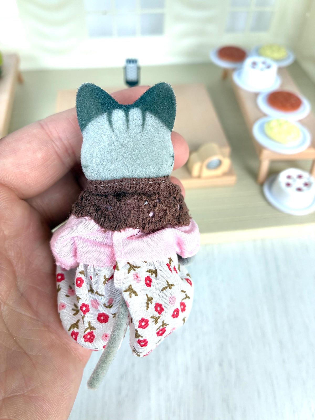 Calico Critters Sylvanian Families grey cat grandmother from the Marquee set, back view showing full flocking on ear backs and head