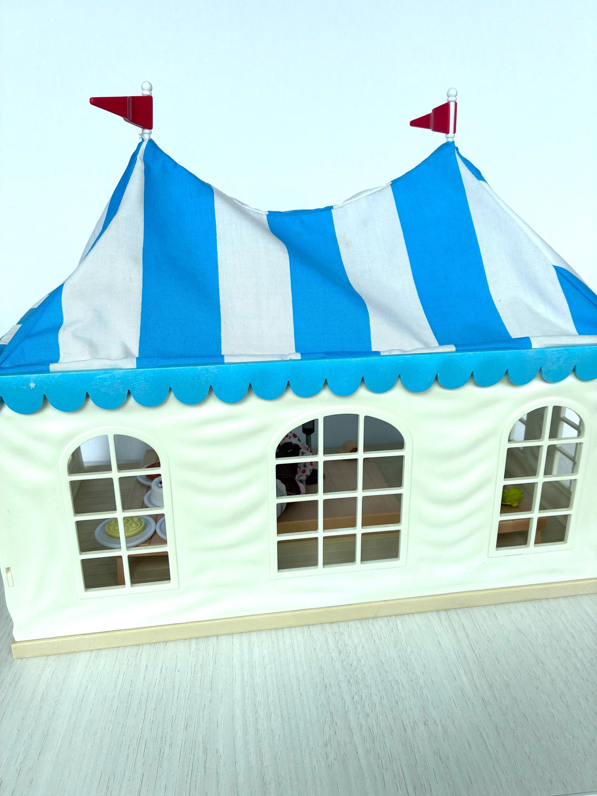 Calico Critters Sylvanian Families Marquee Flair 4495 full front elevation with both red flags and arched windows