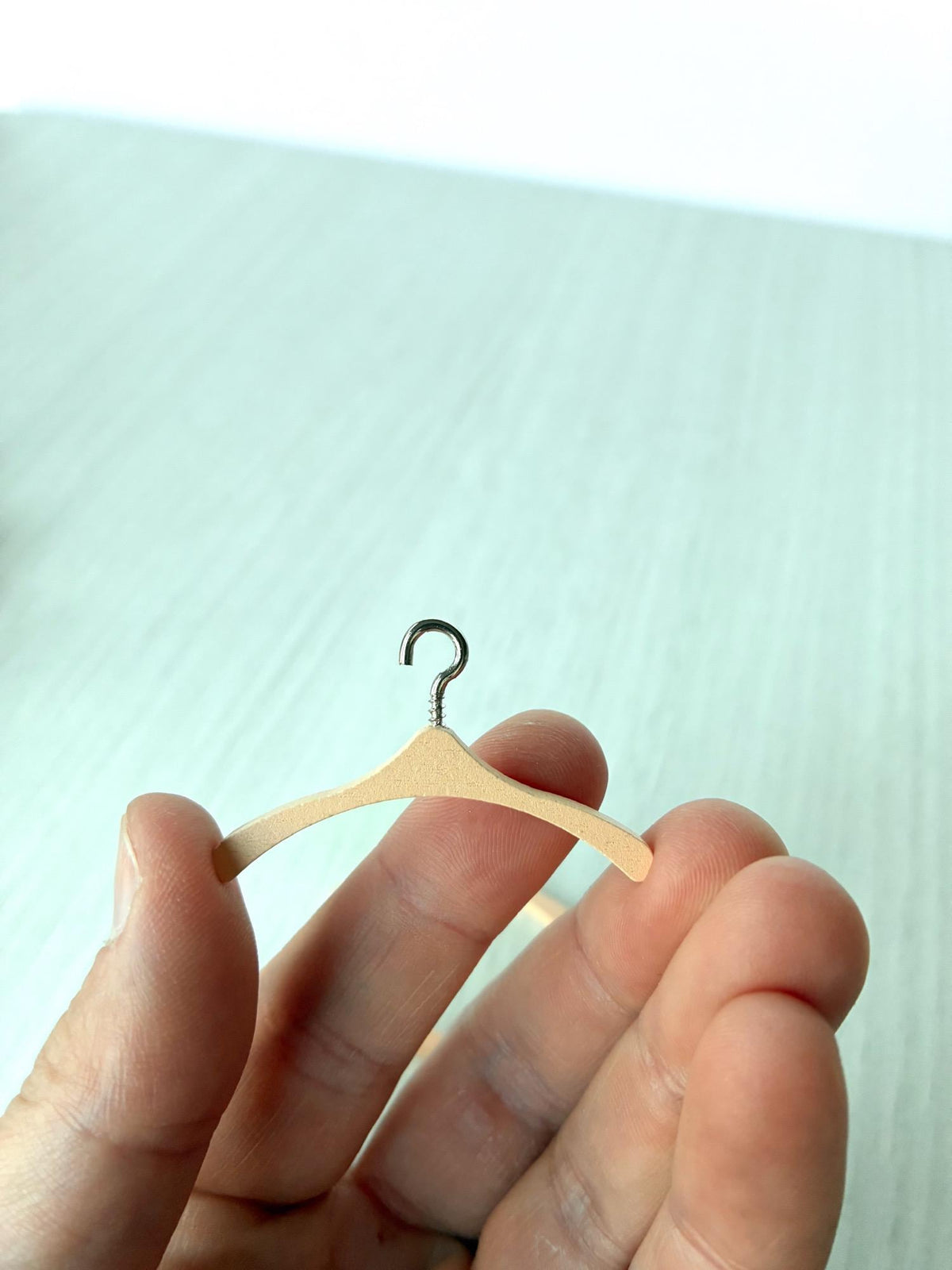 Miniature peach clothes hangers with silver hooks for Calico Critters and Sylvanian Families clothes – photo 2 of 4
