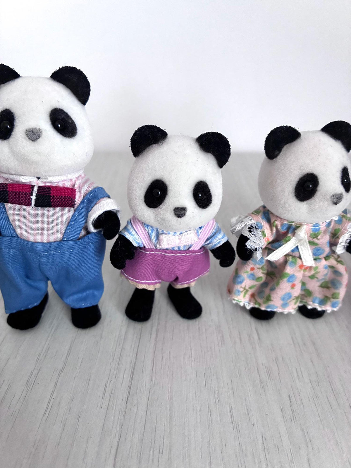 Calico Critters Sylvanian Families vintage Bamboo Panda family of 4, father, son and daughter figures close up front view