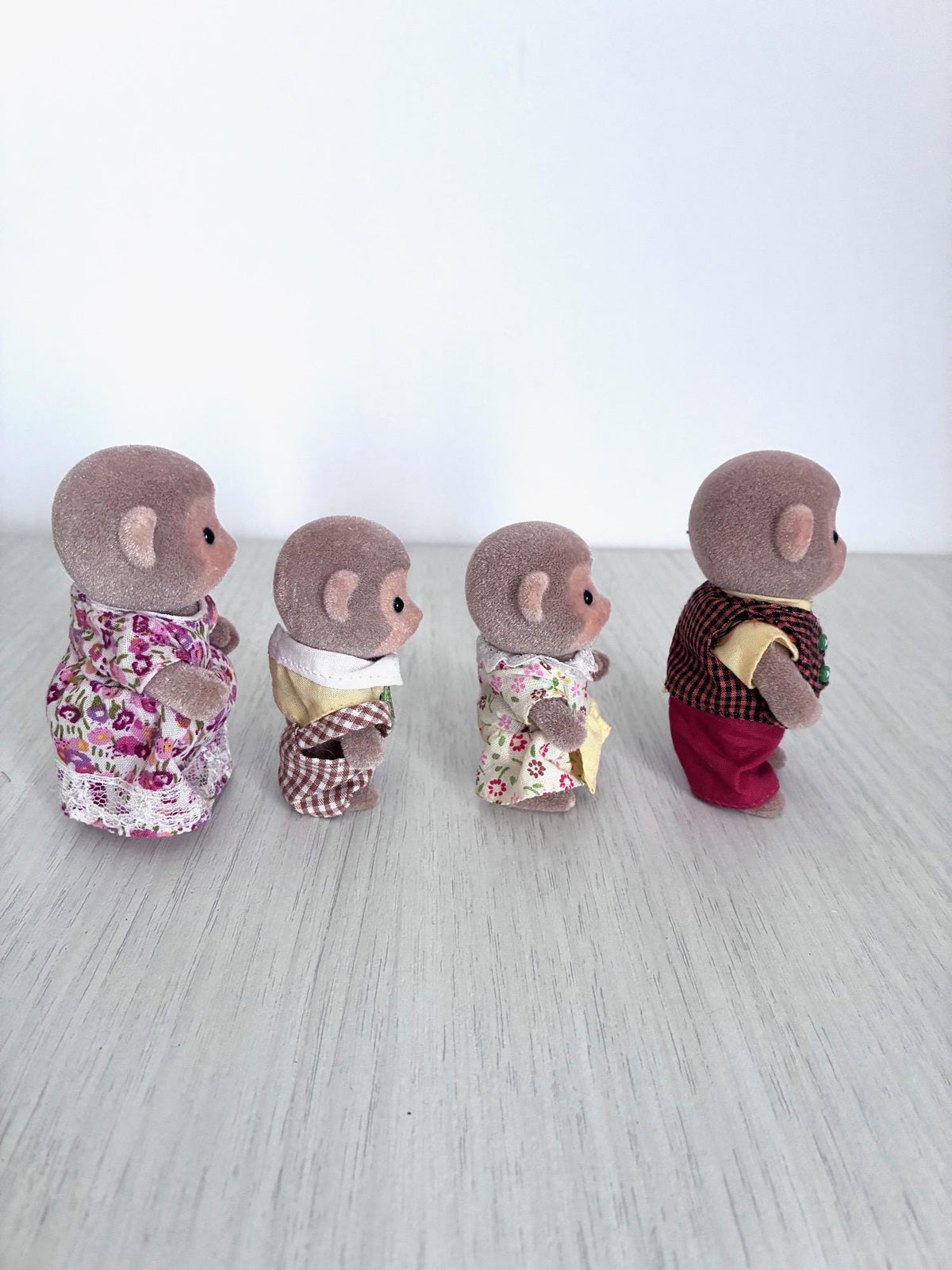 Calico Critters Sylvanian Families Monkey Family, back view showing outfits