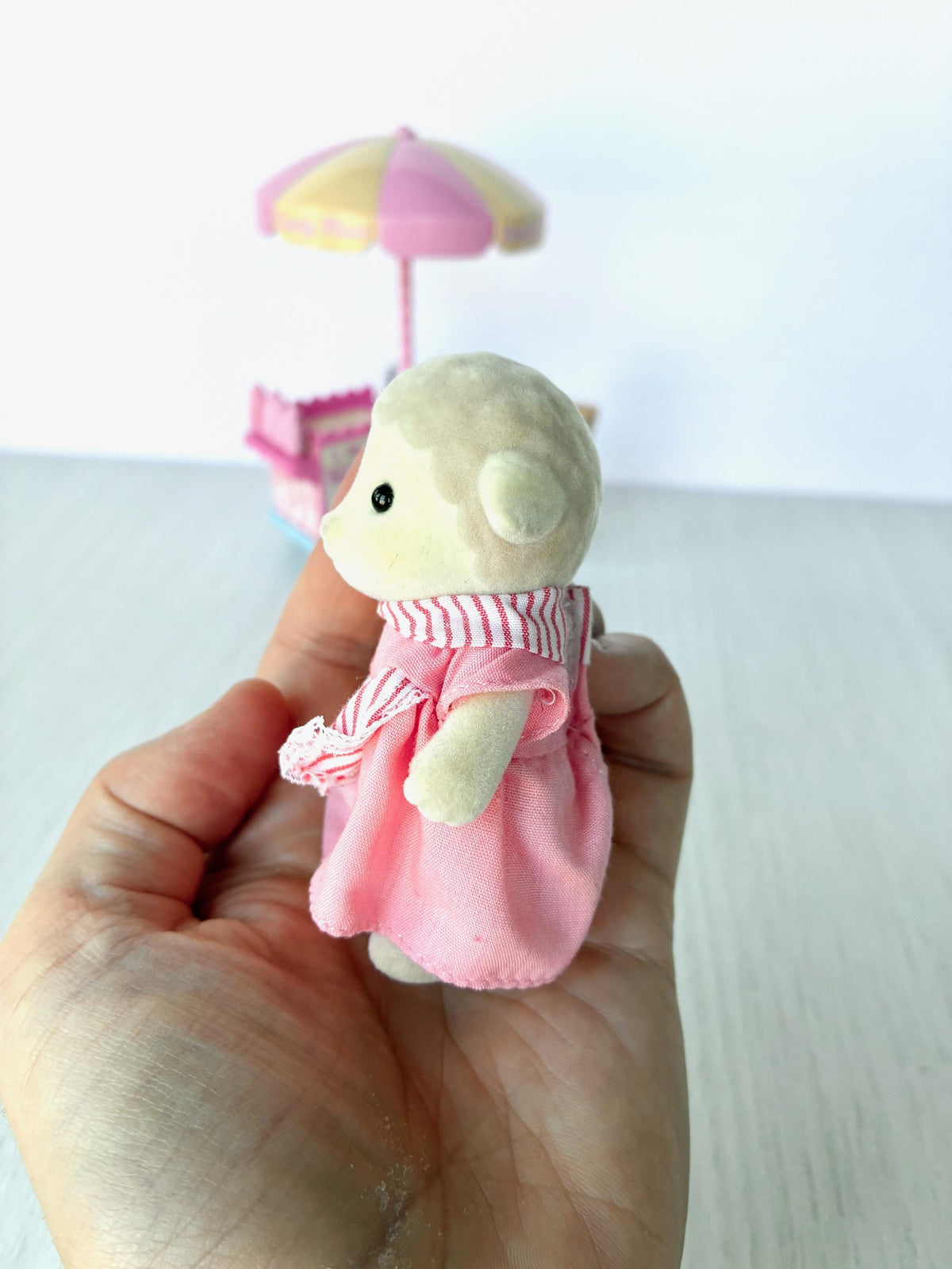 Sylvanian Families Calico Critters Dolly's Candy Floss (Flair 4678) Dolly Dale sheep figure other side view in hand