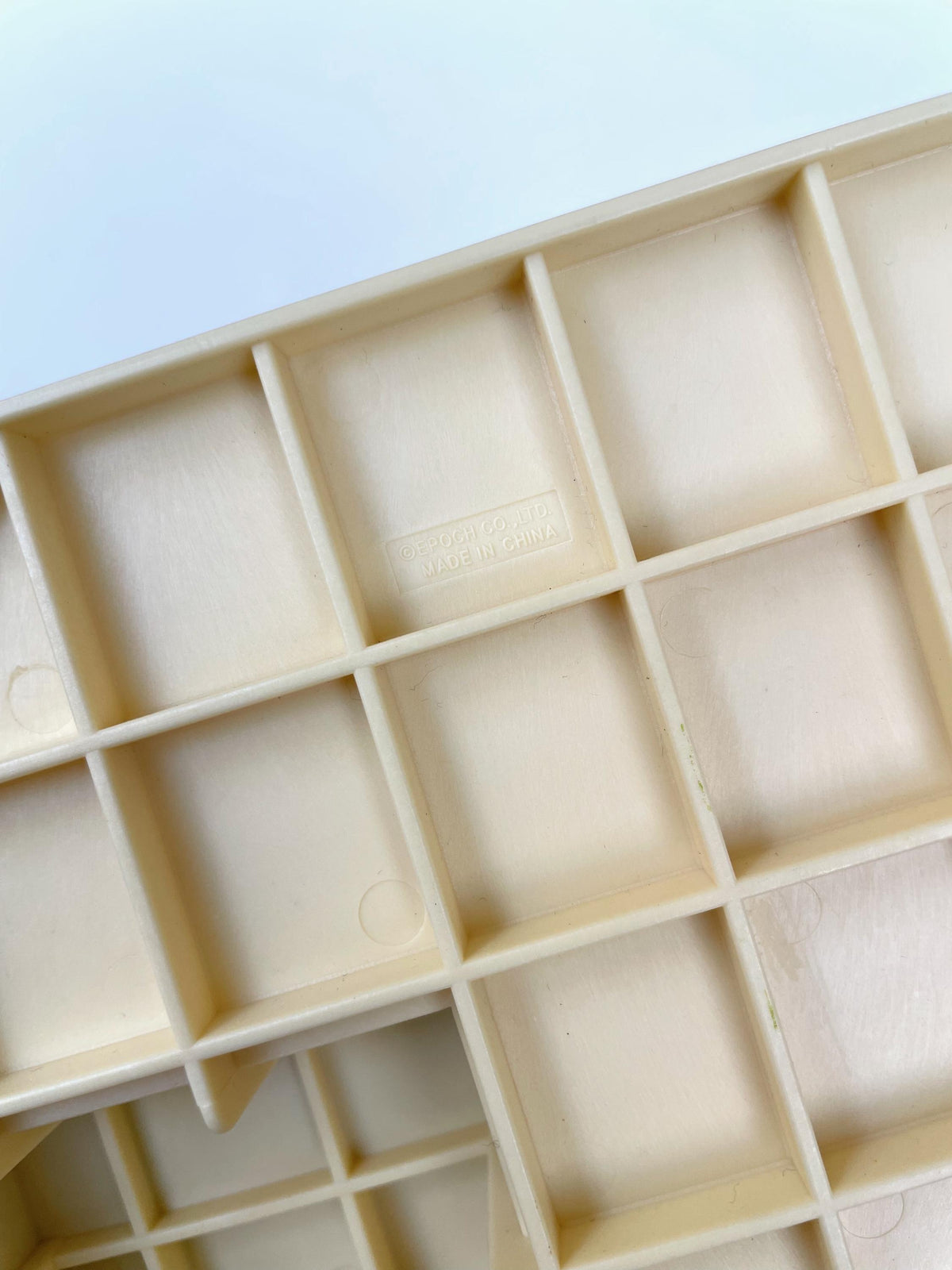 Moulded EPOCH CO LTD maker stamp on the base of the J. Sainsbury Grocery Shop, Sylvanian Families Calico Critters