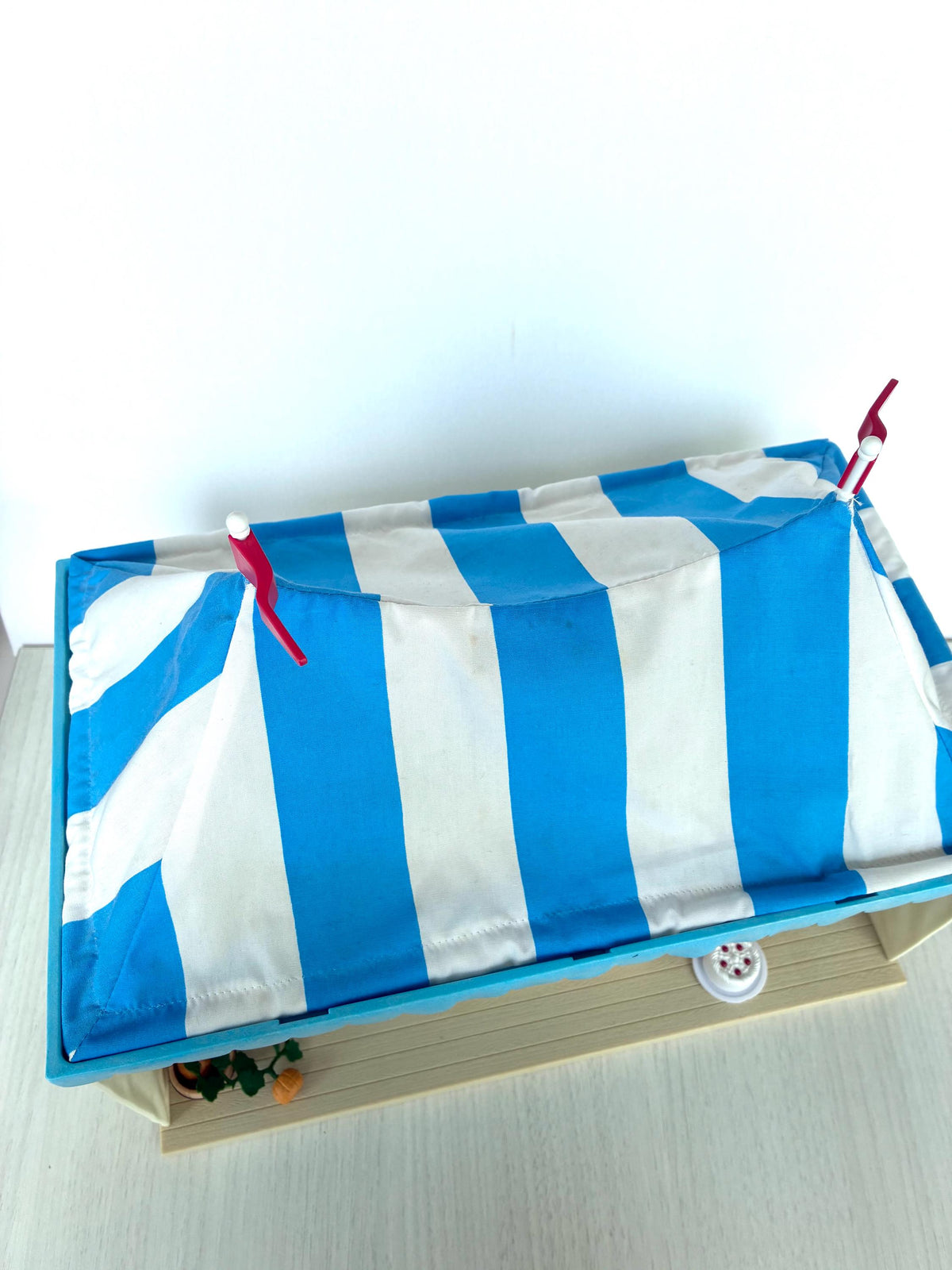 Calico Critters Sylvanian Families Marquee Flair 4495 with the striped roof fitted, rear three quarter view