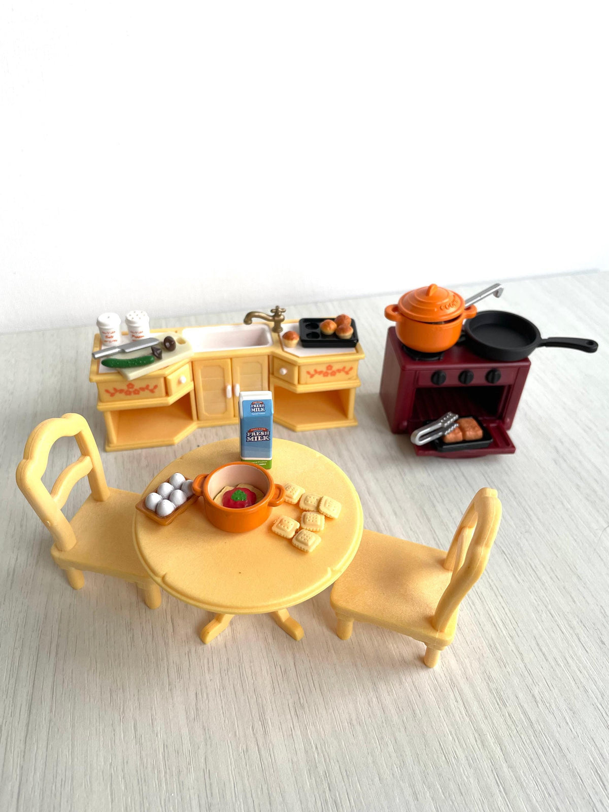 Vintage Calico Critters Sylvanian Families kitchen set fully staged with sink unit, cooker, table and chairs and food accessories