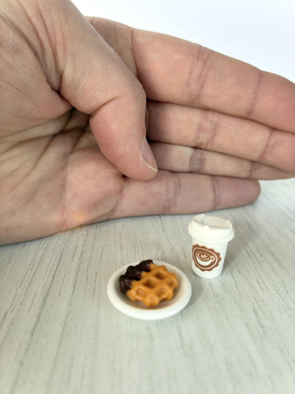 Calico Critters Sylvanian Families waffle and latte with hand for scale
