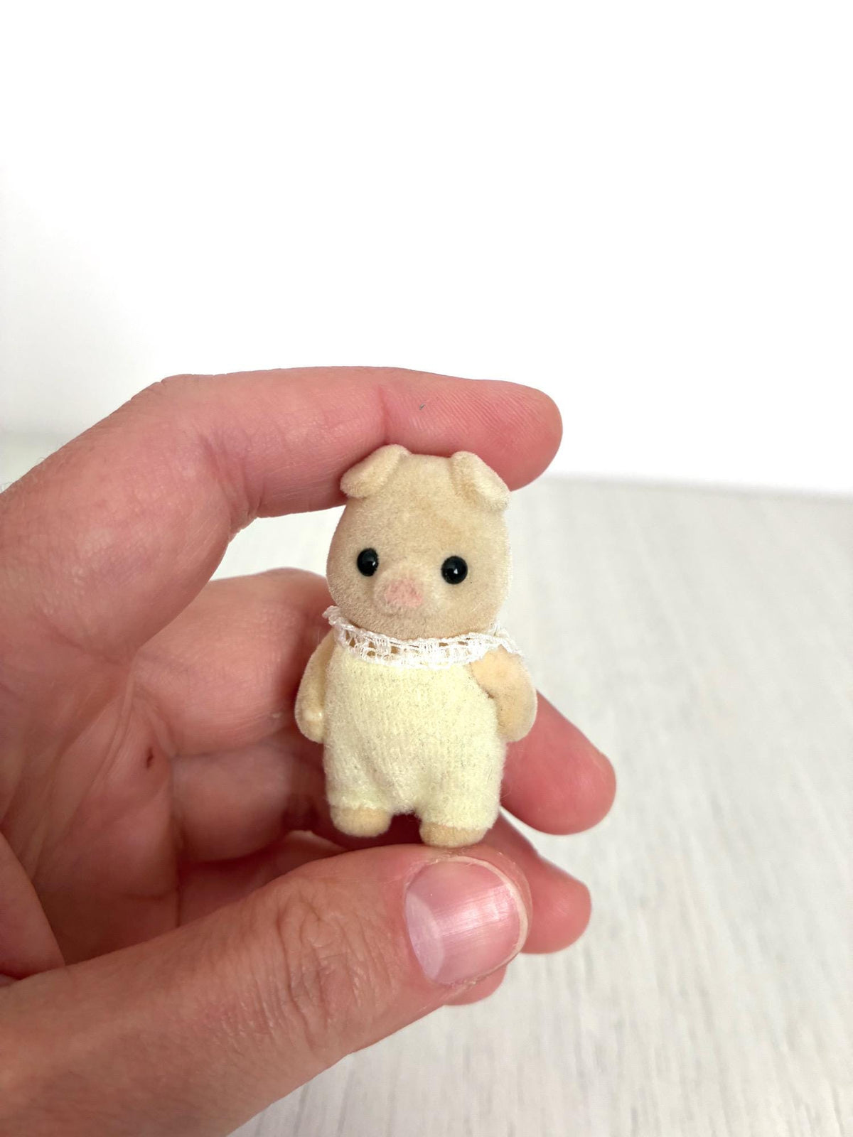 Calico Critters Sylvanian Families piglet baby, close up front view