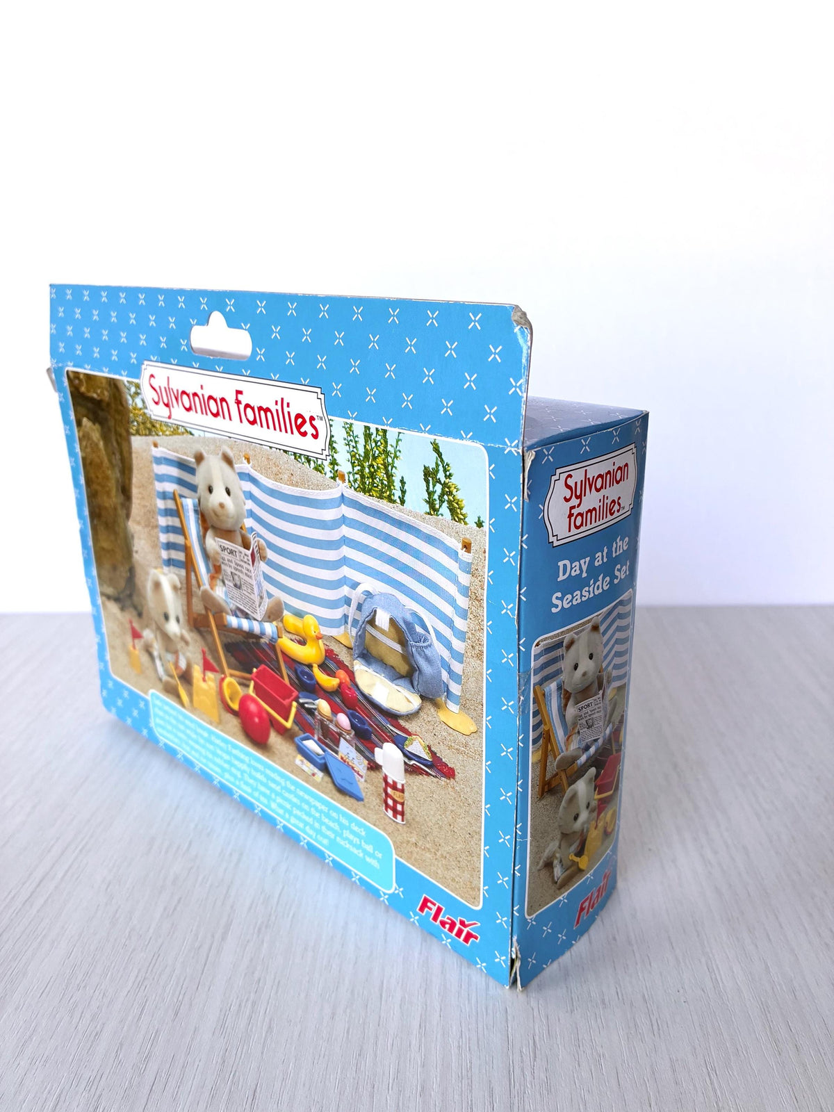 Sylvanian Families Calico Critters Day at the Seaside Set (Flair 4870): original Flair box side and back view showing light corner wear