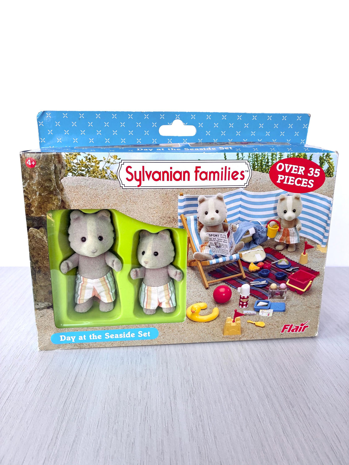 Sylvanian Families Calico Critters Day at the Seaside Set (Flair 4870): original Flair box front with green insert, Day at the Seaside Set, over 35 pieces